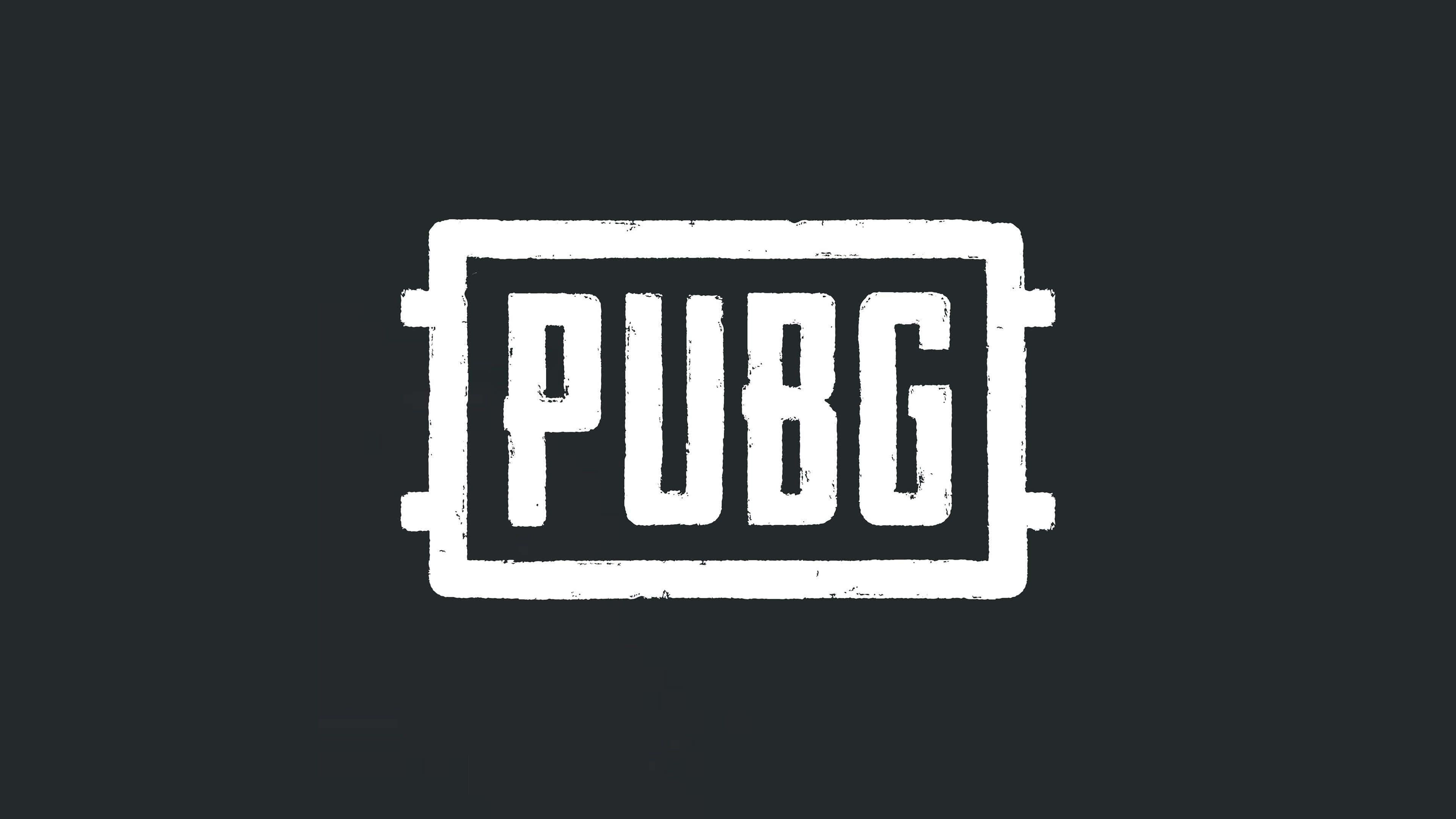 桌布 壁紙 — 大膽的白色PUBG標誌，邊緣磨損，居中於深灰色背景上。