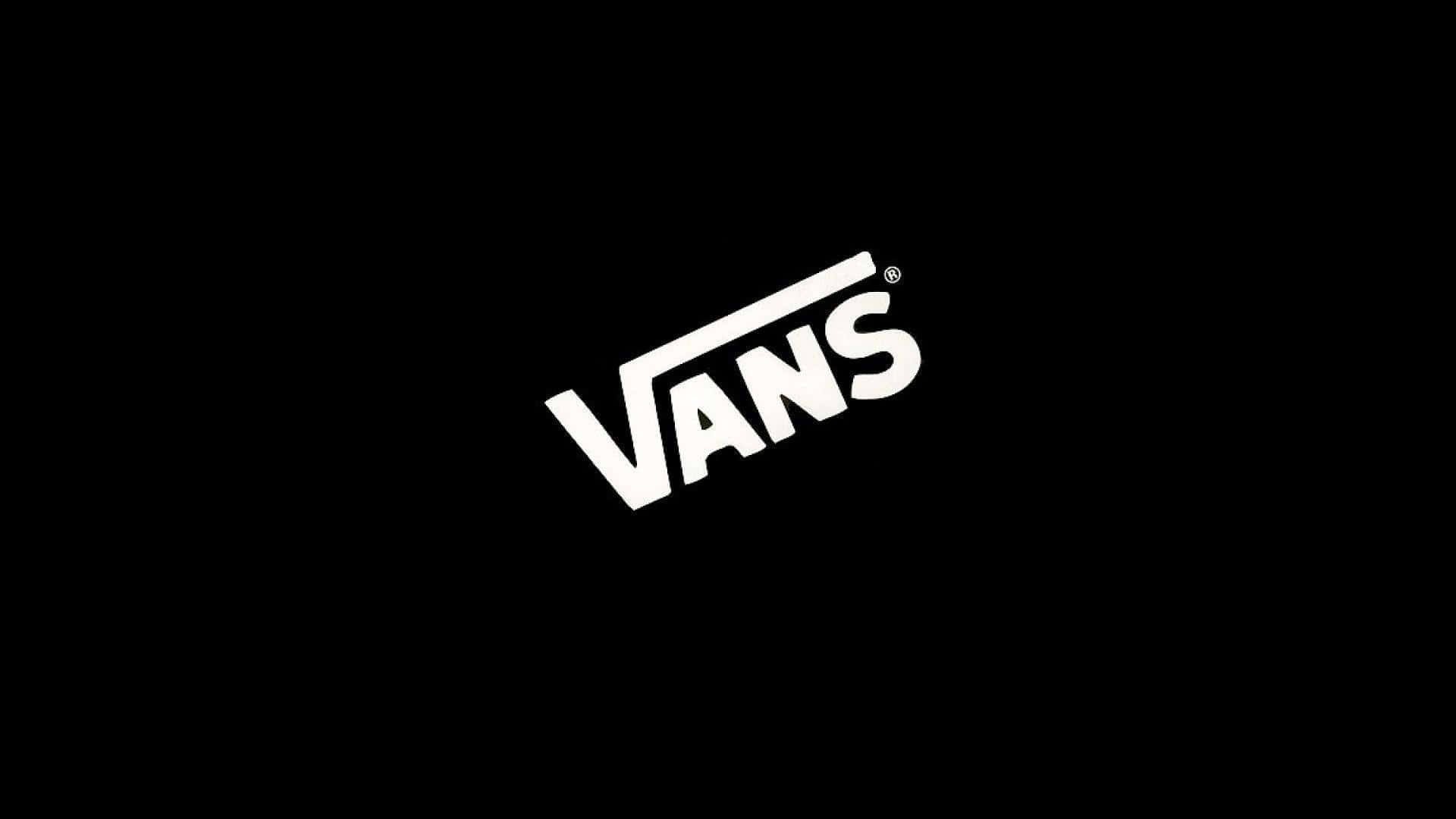 桌布 壁紙 — 大膽的白色Vans標誌居中在純黑色背景上，搭配簡潔的極簡設計。