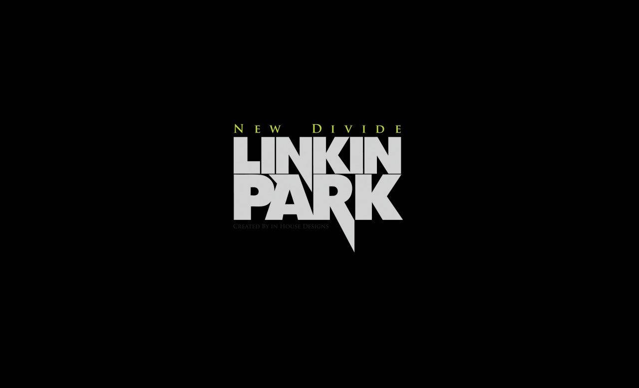 標誌 桌布 壁紙 — 大膽的白色和金色 Linkin Park 標誌居中於純黑色背景上，上方有 'New Divide'。