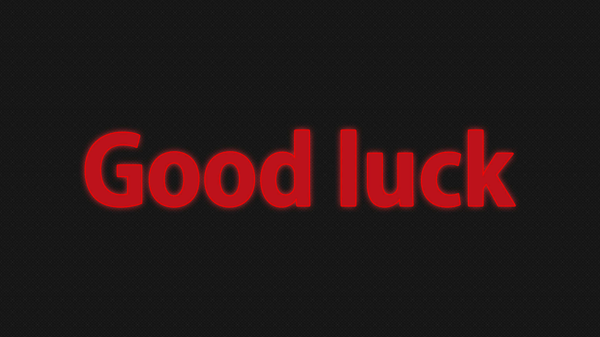 Good Luck 桌布 壁紙 — 大膽的紅色「Good luck」文字在帶有微妙網格圖案的深色紋理背景上發光。