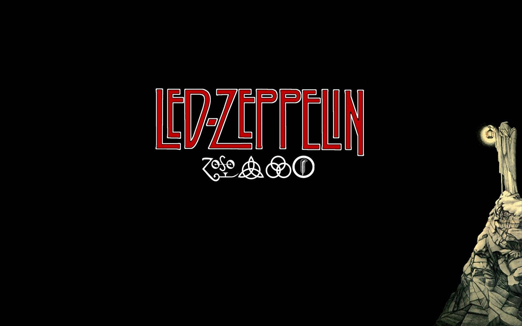 攝影 桌布 壁紙 — 大膽的紅色 Led Zeppelin 標誌，帶有白色符號，黑色背景，旁邊是一座手持發光球體的石像。
