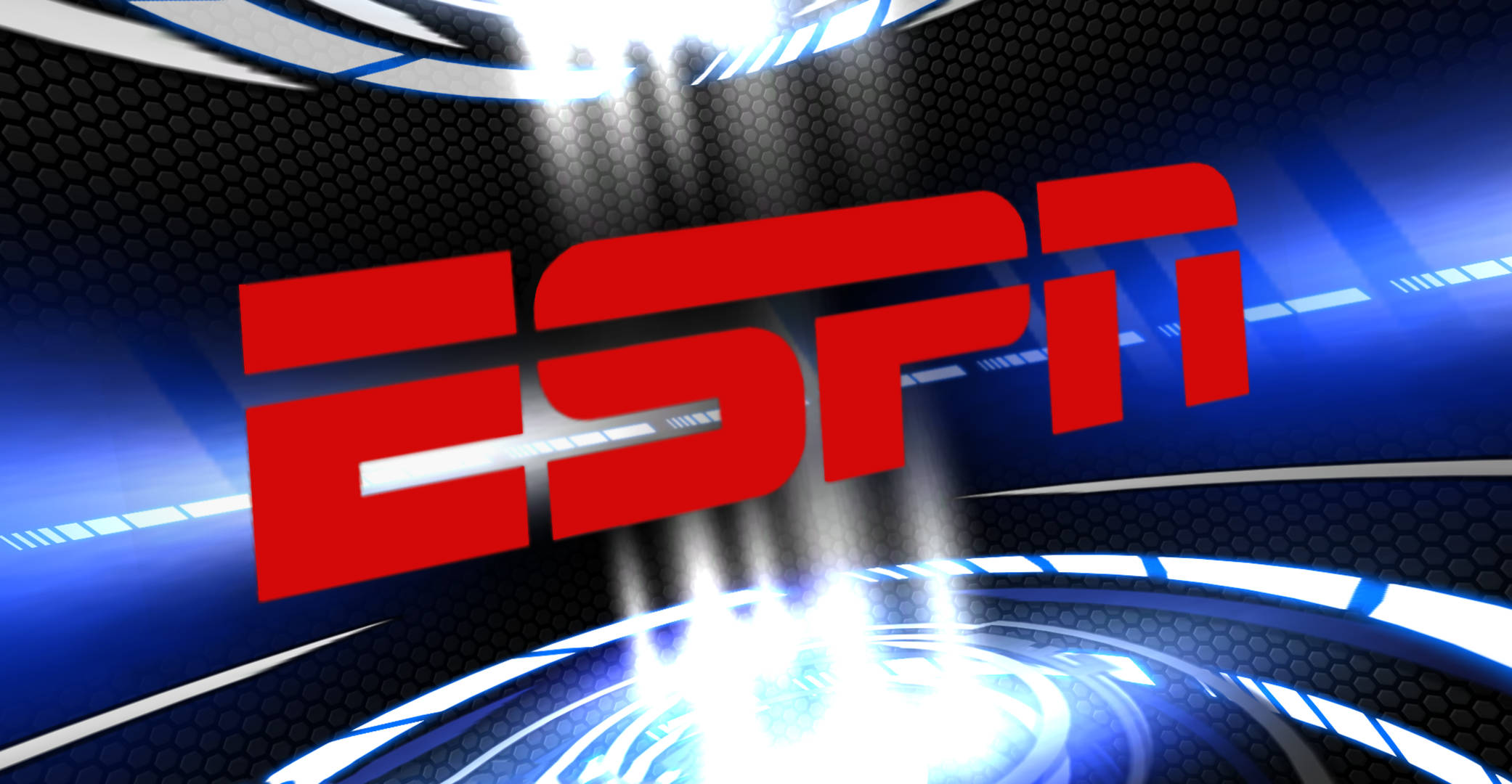 Espn 桌布 壁紙 — 大膽的紅色ESPN標誌在明亮的聚光燈下發光，背景是未來感的藍色和黑色六邊形。