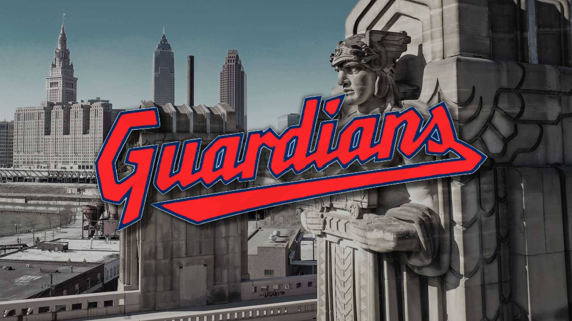 克里夫蘭守護者 桌布 壁紙 — 大膽的紅色Guardians標誌疊加在復古城市景觀上，其中有石頭守護者雕像和積雪的摩天大樓。