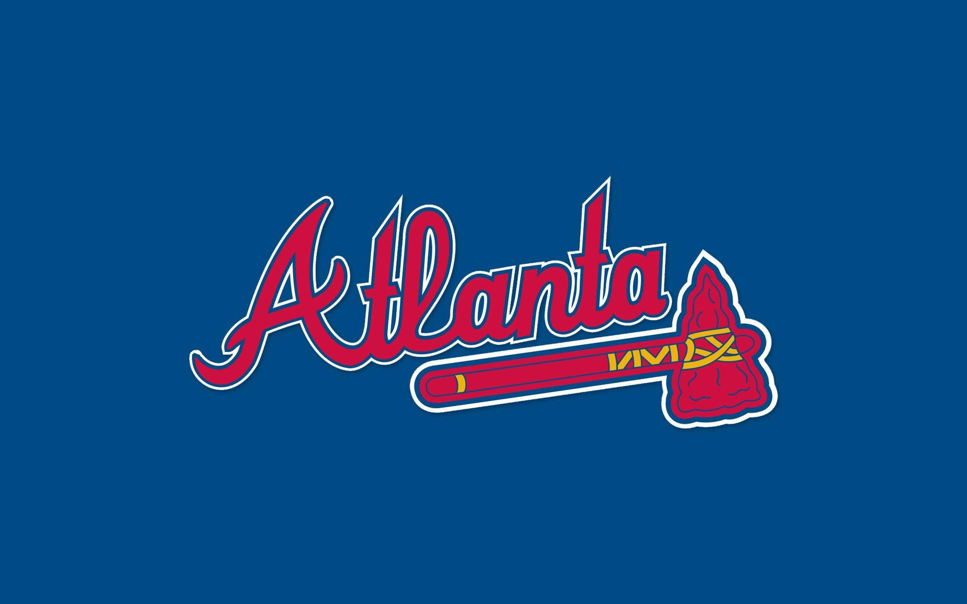 Braves 桌布 壁紙 — 大膽的紅色亞特蘭大勇士隊標誌，中心帶有戰斧圖案，置於純藍色背景上。