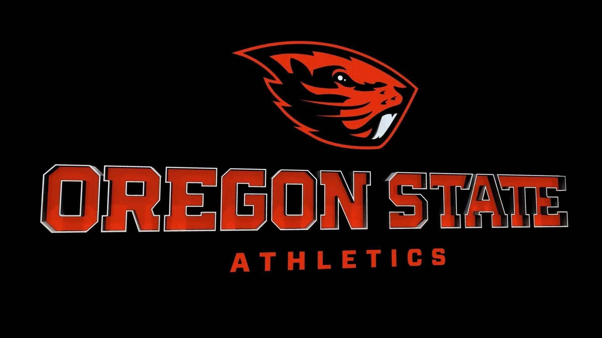 Oregon 桌布 壁紙 — 大膽的紅色俄勒岡州立大學運動會標誌，黑色背景上帶有兇猛的海狸吉祥物。
