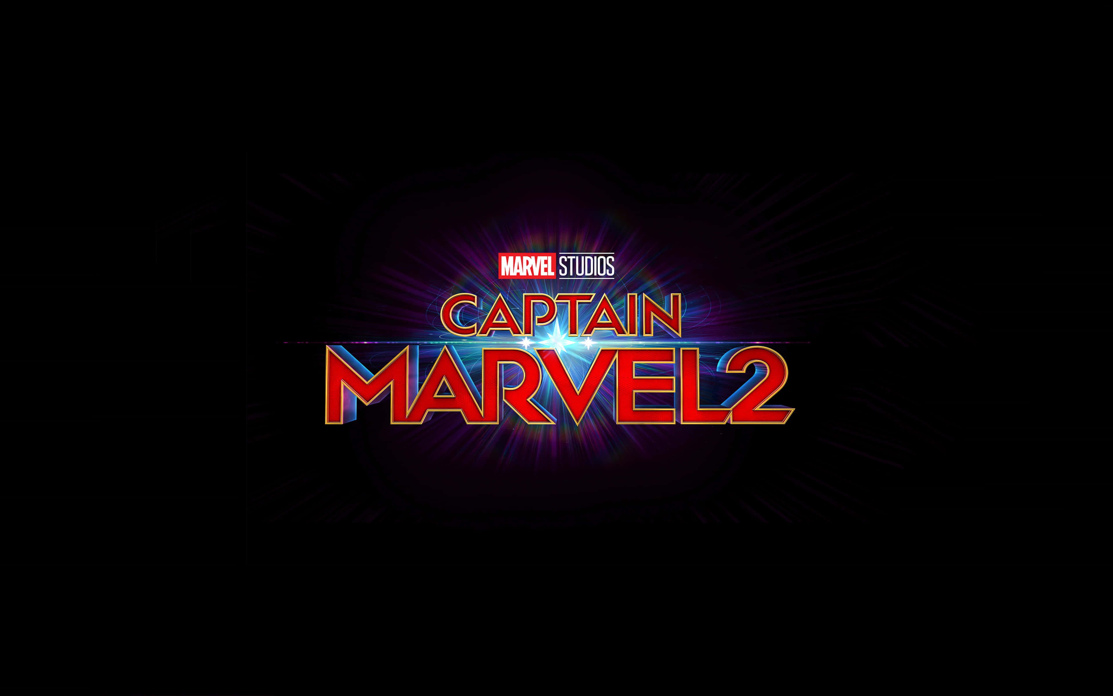 桌布 壁紙 — 大膽的紅色和藍色「Captain Marvel 2」標題在黑暗背景上發出電光。