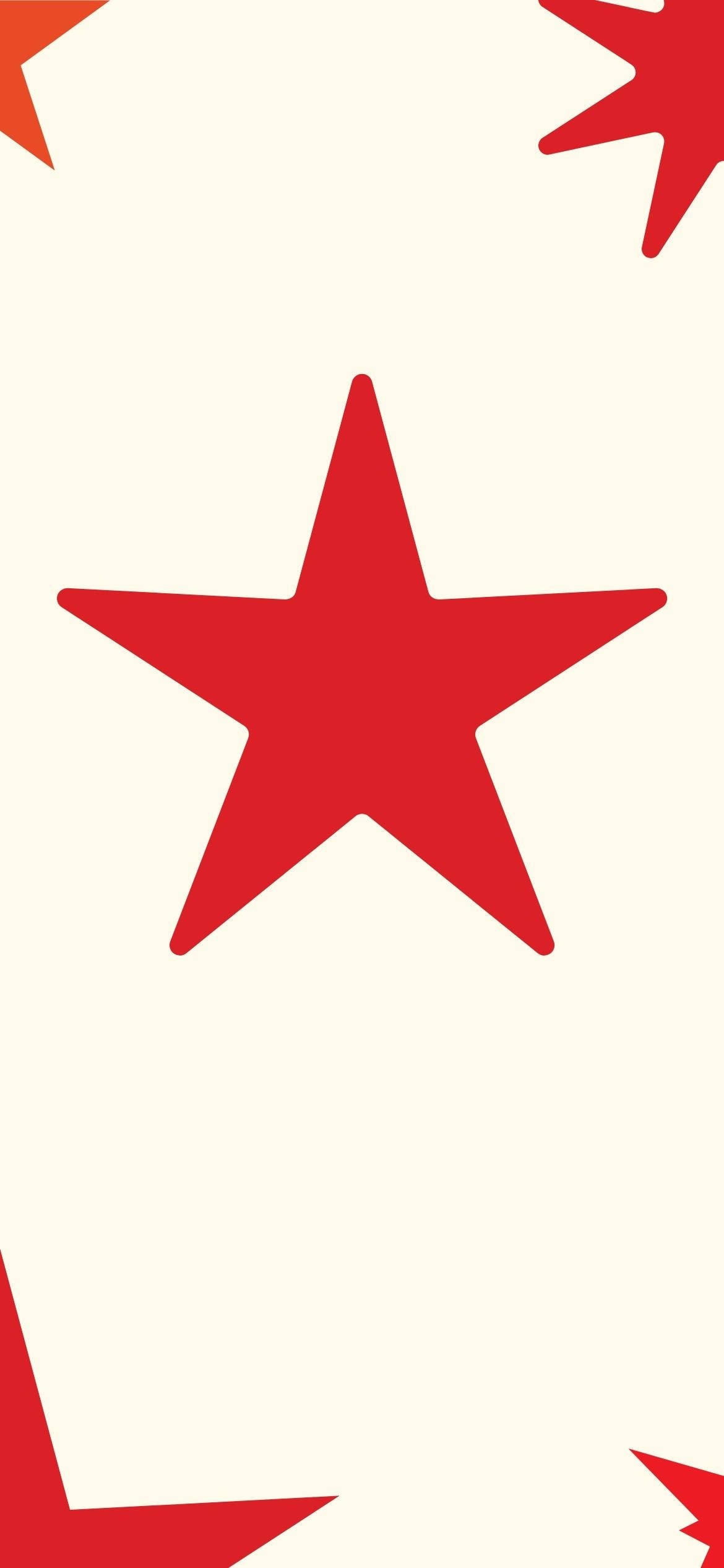 Red Star 桌布 壁紙 — 大膽的紅色星星漂浮在奶油色的米白色背景上，形成極簡的重複圖案。