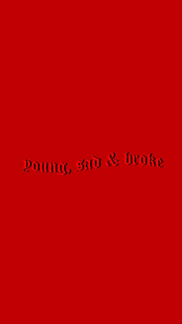iPhone baddie 桌布 壁紙 — 大膽的紅色背景，帶有哥德式文字，中央寫著 young sad & broke。