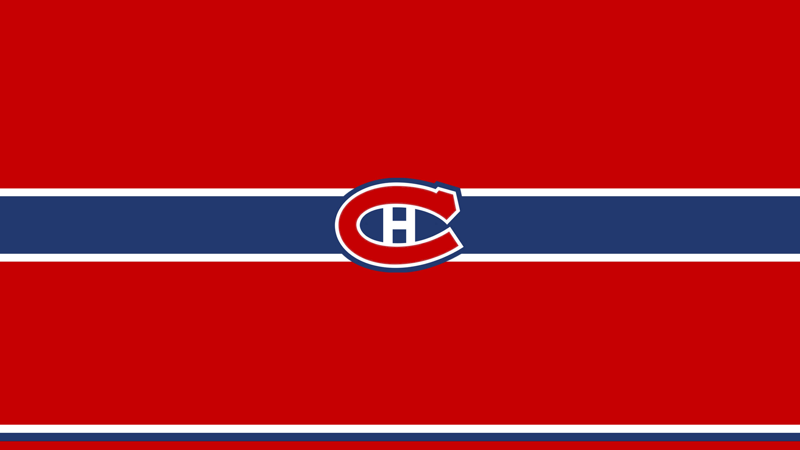 Canadiens 桌布 壁紙 — 大膽的紅色背景，帶有海軍藍和白色條紋，蒙特婁加拿大人隊標誌居中突出。