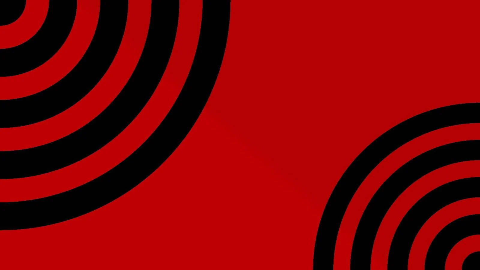 Red Circle 桌布 壁紙 — 大膽的紅色背景，黑色同心圓營造出動態抽象圖案。