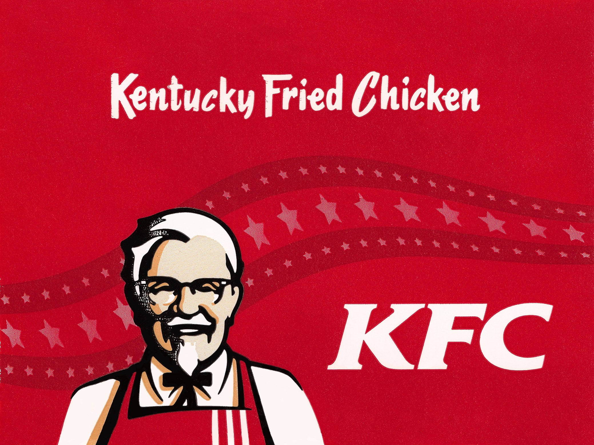 Kfc 桌布 壁紙 — 大膽的紅色背景展示了標誌性的KFC桑德斯上校標誌，帶有白色星星和品牌文字。