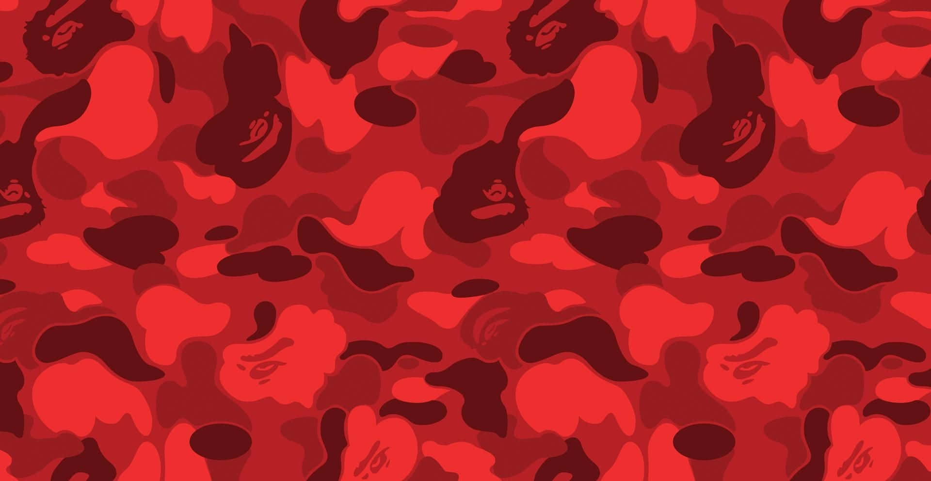 Red Bape 桌布 壁紙 — 大膽的紅色迷彩圖案，重複出現風格化的猿頭，採用深紅和酒紅色的不同色調。