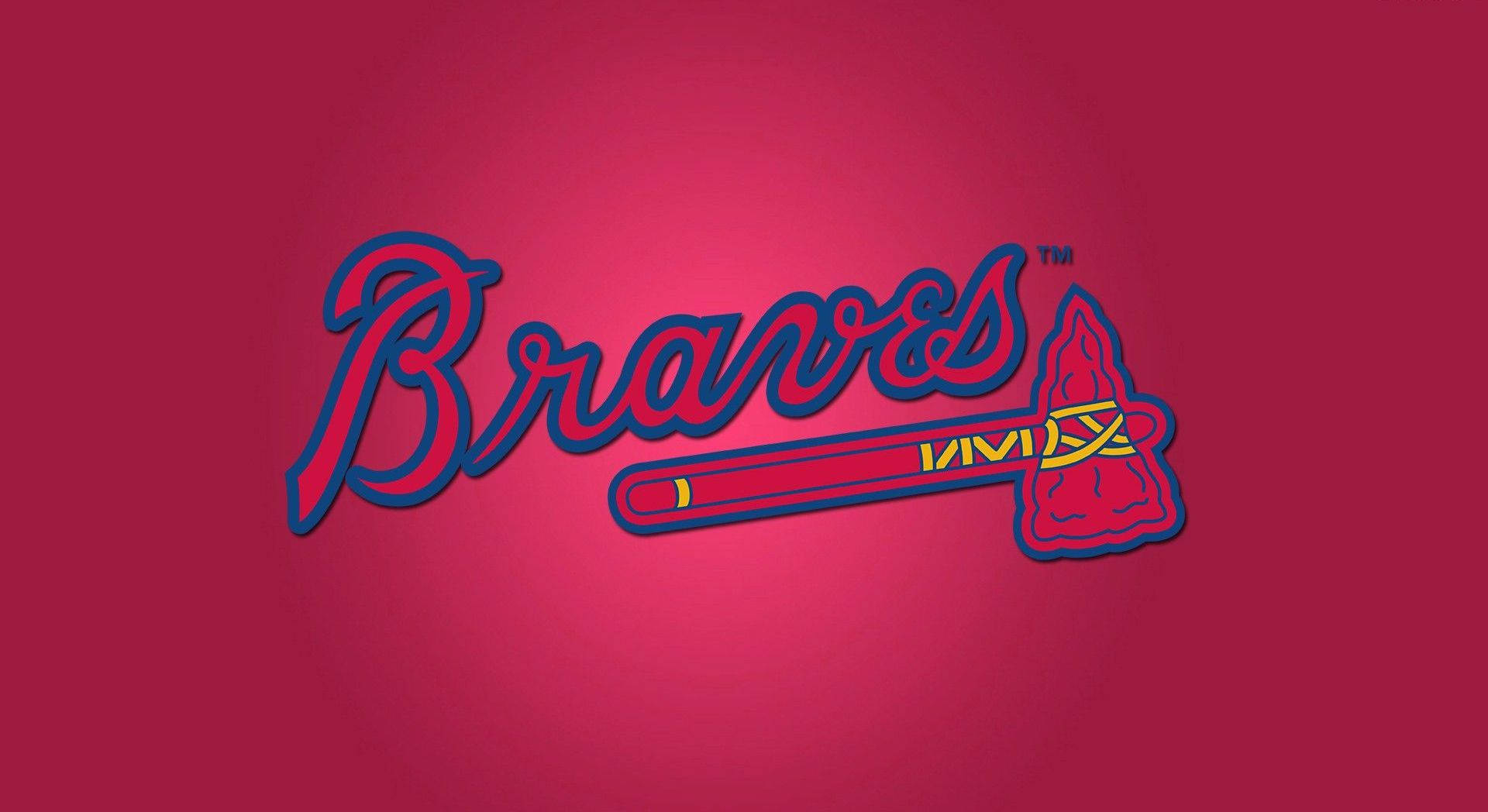 Braves 桌布 壁紙 — 大膽的紅藍勇士隊標誌，中心有戰斧圖案，背景為洋紅色漸變。