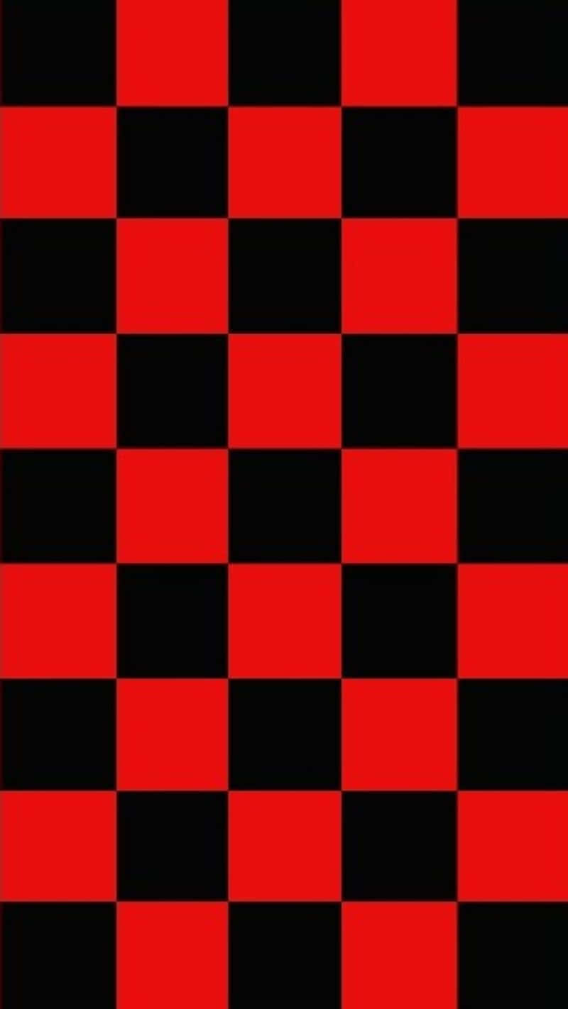 Black And Red Plaid 桌布 壁紙 — 大膽的紅黑棋盤格圖案填滿整個畫面，呈現高對比的幾何方形。