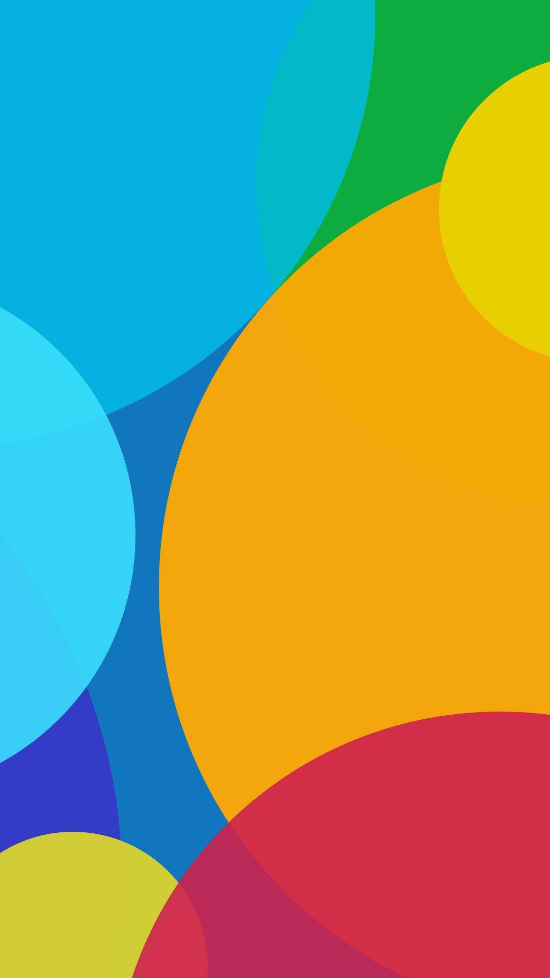 Xiaomi 桌布 壁紙 — 大膽的藍色、綠色、黃色和紅色的鮮豔重疊圓圈，創造出動態的抽象構圖。