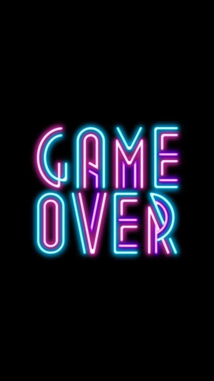 Neon Lights Aesthetic 桌布 壁紙 — 大膽的螢光粉紅和藍色 'GAME OVER' 文字在漆黑背景上發光。