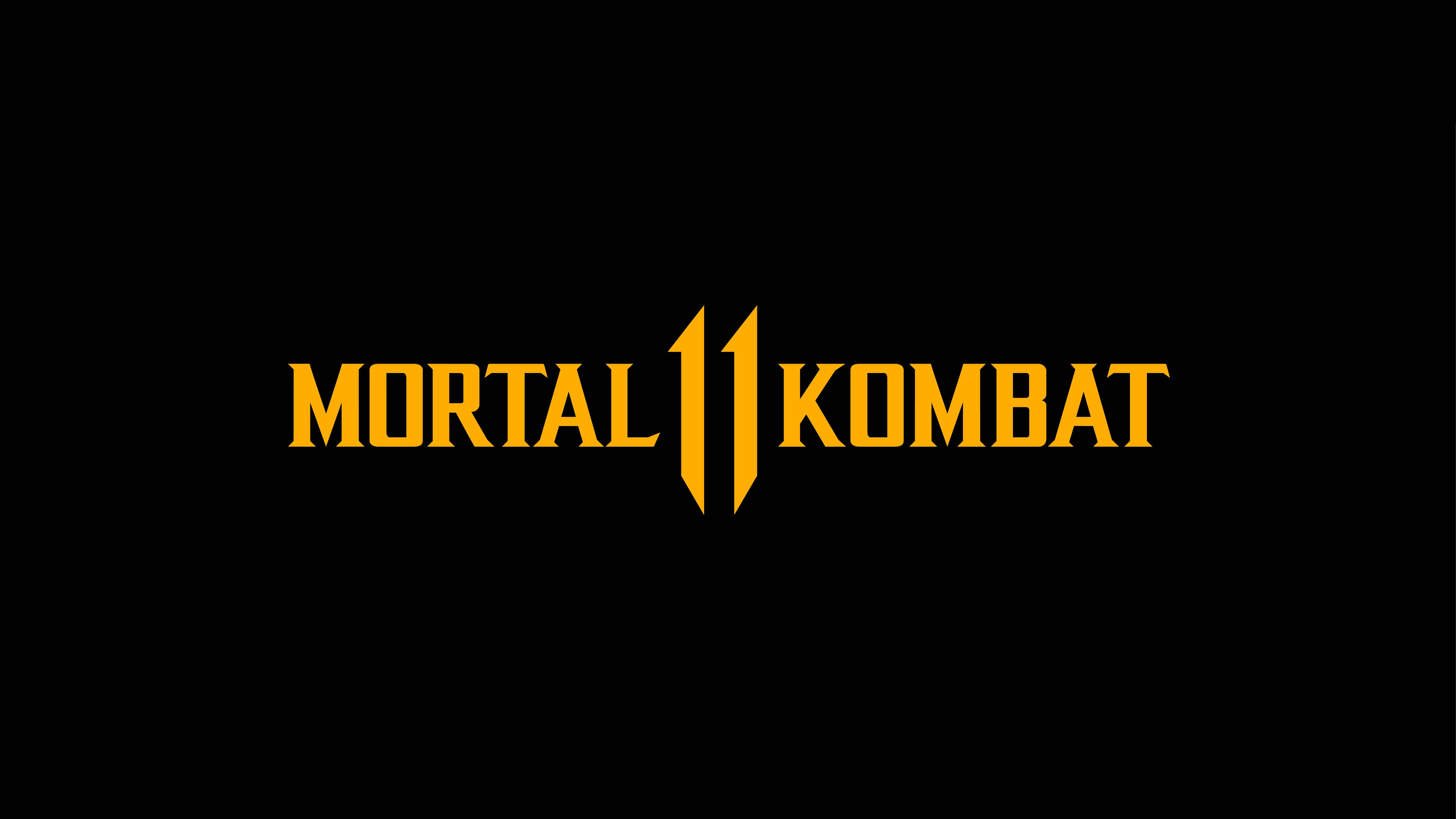 真人快打11 桌布 壁紙 — 大膽的黃色Mortal Kombat標誌居中於純黑色背景上，帶有尖銳的角形字體。
