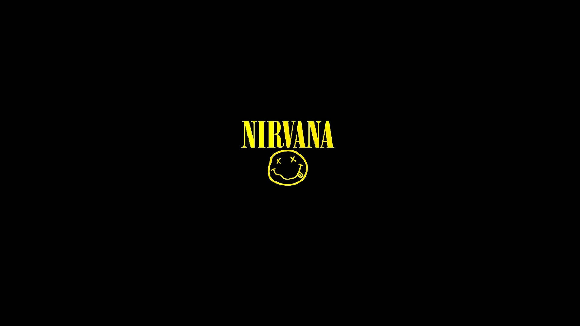 nirvana 4K 桌布 壁紙 — 大膽的黃色Nirvana標誌搭配笑臉，襯以鮮明的黑色背景。