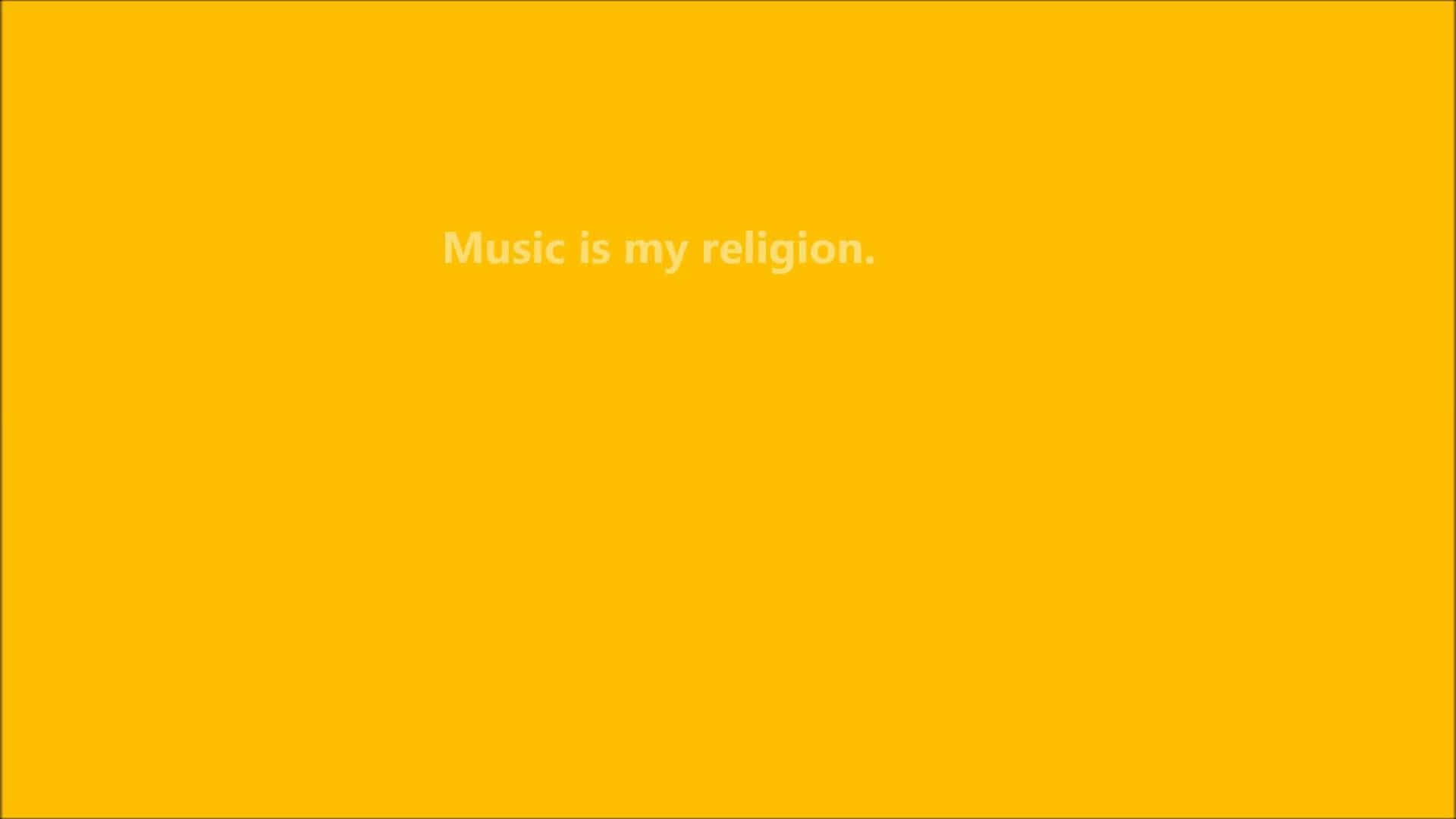 Aesthetic Yellow 桌布 壁紙 — 大膽的黃色背景，中央白色文字宣稱音樂為宗教。