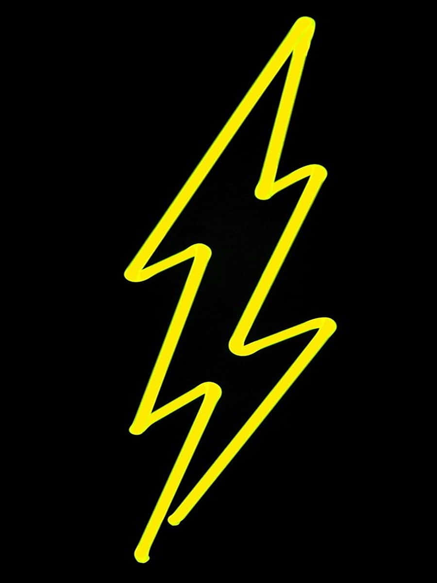 Neon Lightning 桌布 壁紙 — 大膽的黃色閃電圖形在純黑色背景上發光，帶有銳利的角線。