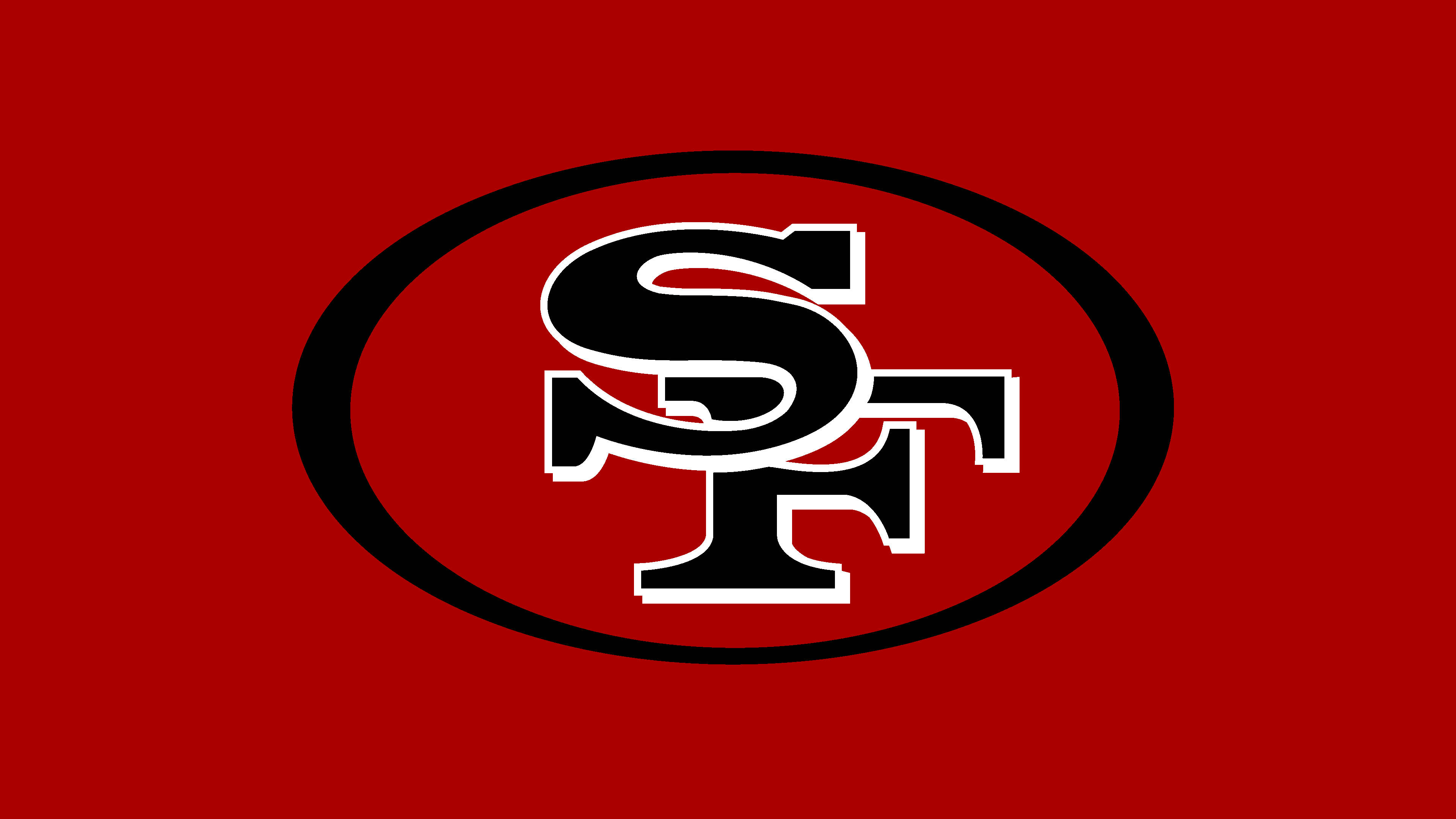 49ers 桌布 壁紙 — 大膽的黑白SF標誌居中在黑色橢圓形內，置於純紅色背景上。