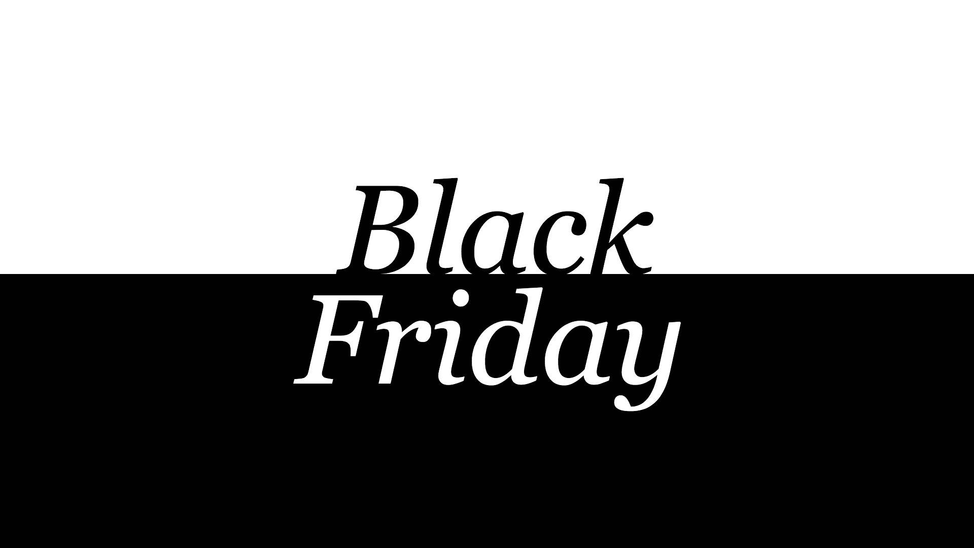 Friday 桌布 壁紙 — 大膽的黑白分割背景，帶有對比字體的「Black Friday」文字。