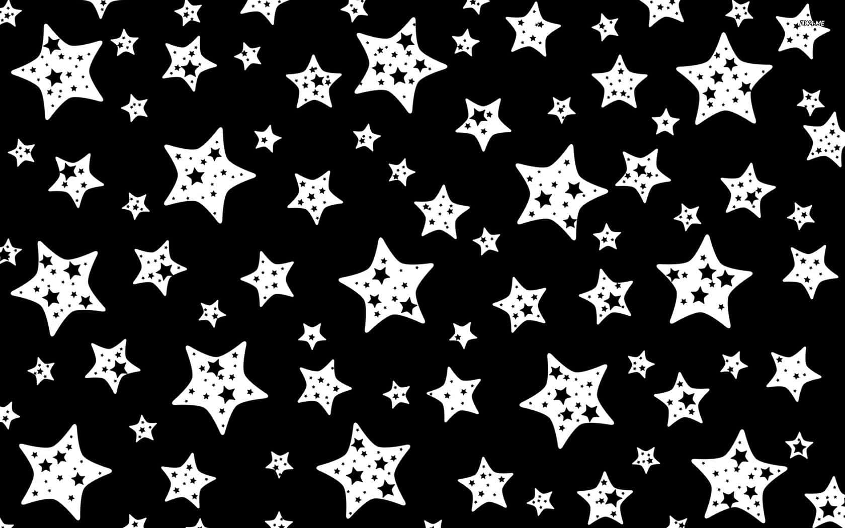 Black And White Pattern 桌布 壁紙 — 大膽的黑白壁紙，散落著大小不一的星星，內部帶有星星圖案。