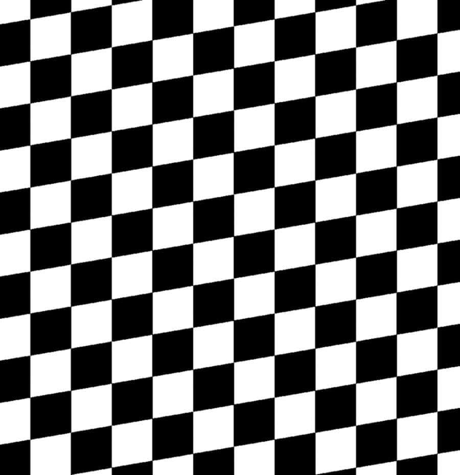 Checkered Flag 桌布 壁紙 — 大膽的黑白格紋圖案以對角透視營造出引人注目的錯覺效果。