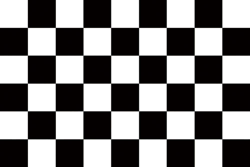 Chequered Flag 桌布 壁紙 — 大膽的黑白棋盤格圖案以銳利的幾何精準度填滿整個畫面。