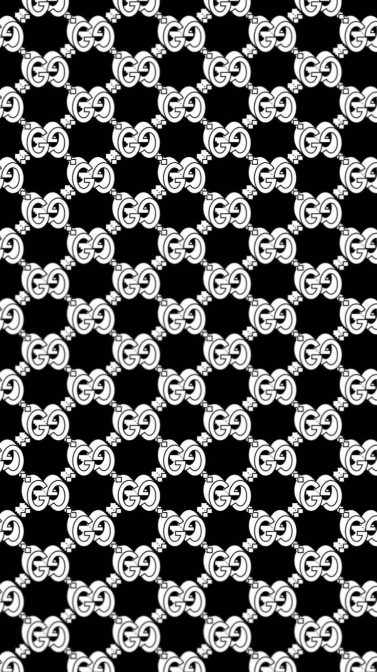 Gucci Pattern 桌布 壁紙 — 大膽的黑白重複圖案，交織的GG標誌形成無縫的奢華壁紙設計。