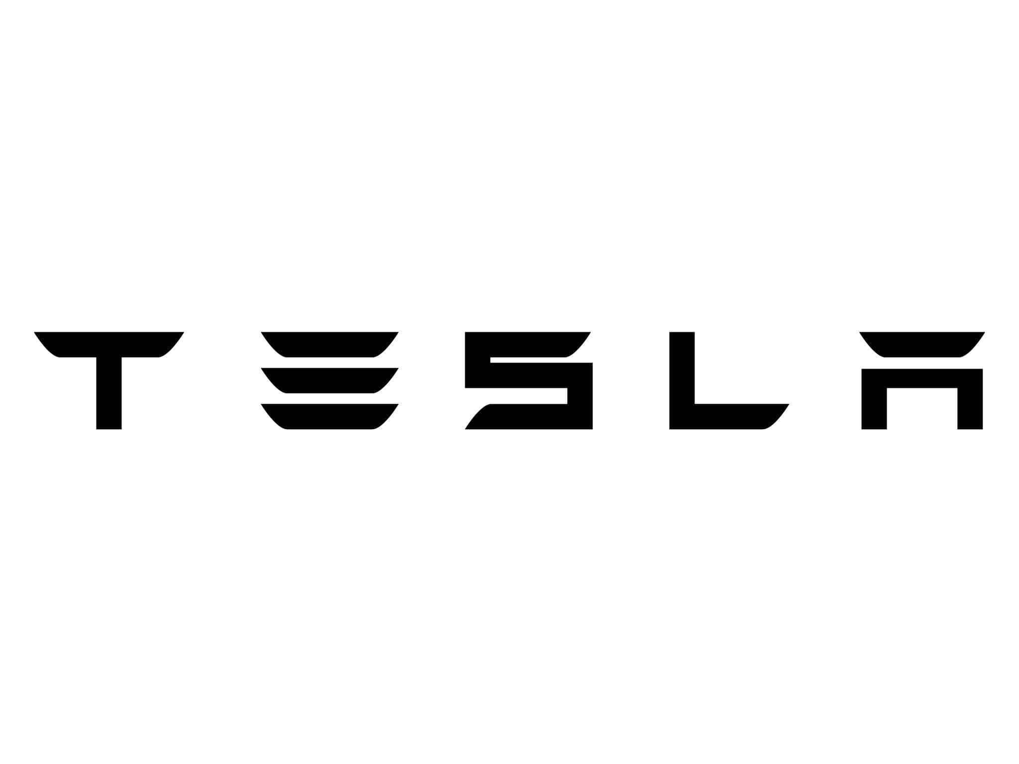 桌布 壁紙 — 大膽的黑色 Tesla 標誌居中於純白色背景上，搭配簡潔的極簡字體。
