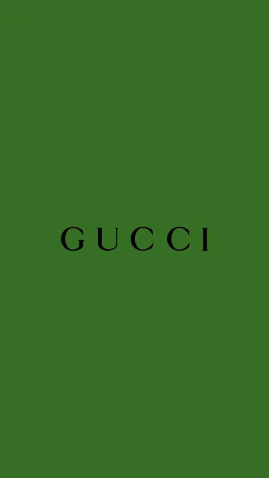 綠色背景上的黑色Gucci標誌 — Gucci GIF 壁紙