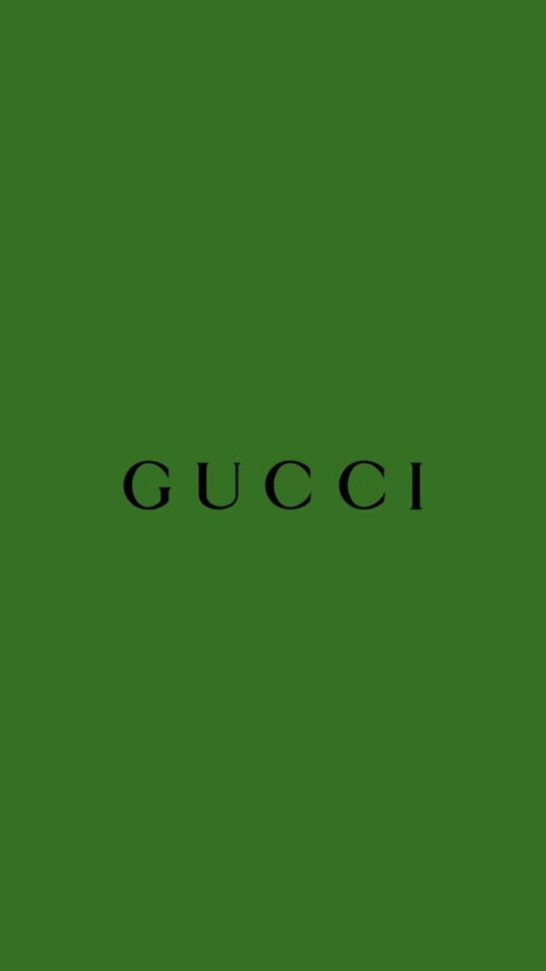 Gucci Green 桌布 壁紙 — 大膽的黑色Gucci標誌居中在純粹的森林綠色背景上。