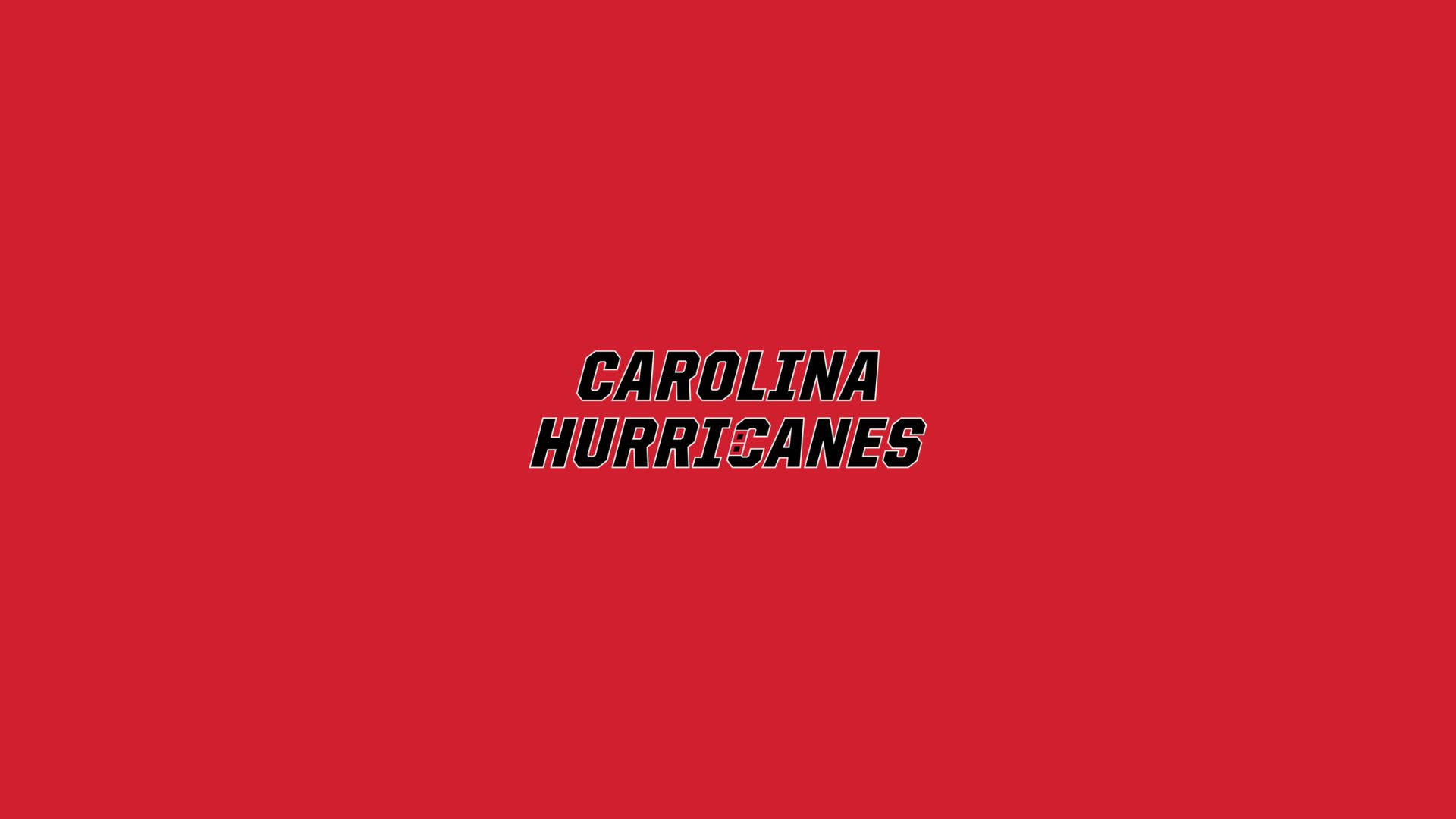 Hurricanes 桌布 壁紙 — 大膽的黑色卡羅萊納颶風隊標誌居中於純紅色背景上，搭配簡潔字體。