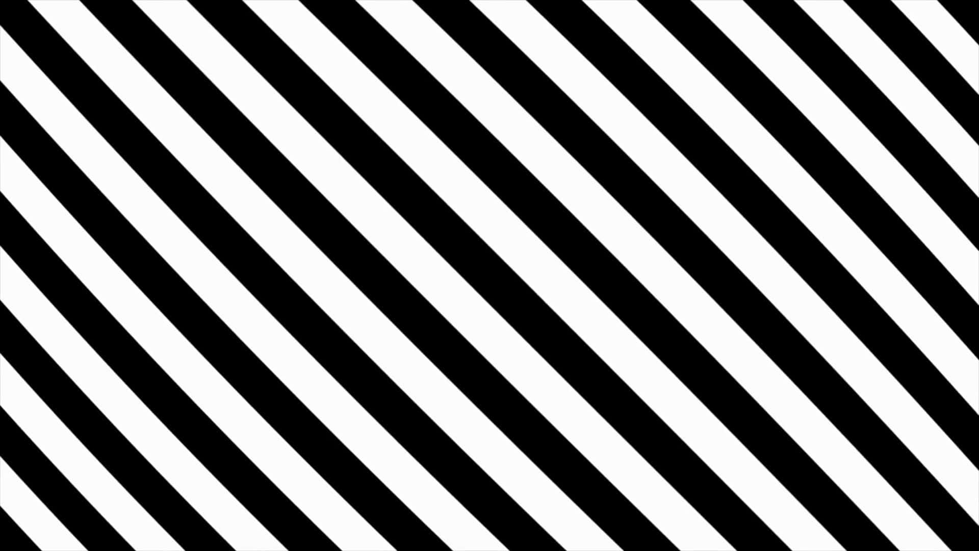 Black And White Striped 桌布 壁紙 — 大膽的黑色和白色對角線條紋在整個畫面中營造出高對比度的幾何圖案。