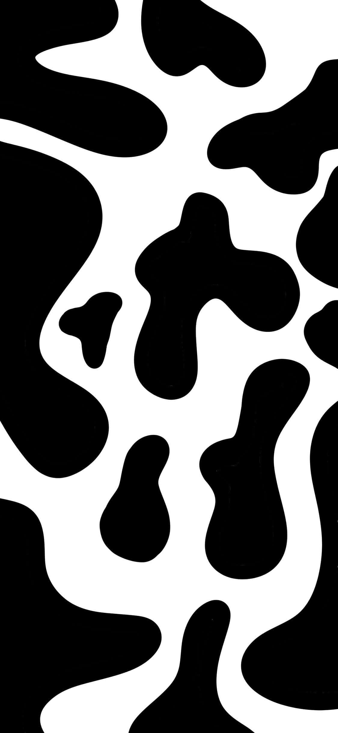 乳牛動圖 桌布 壁紙 — 大膽的黑色有機形狀在純白背景上流動，形成高對比度的抽象圖案。