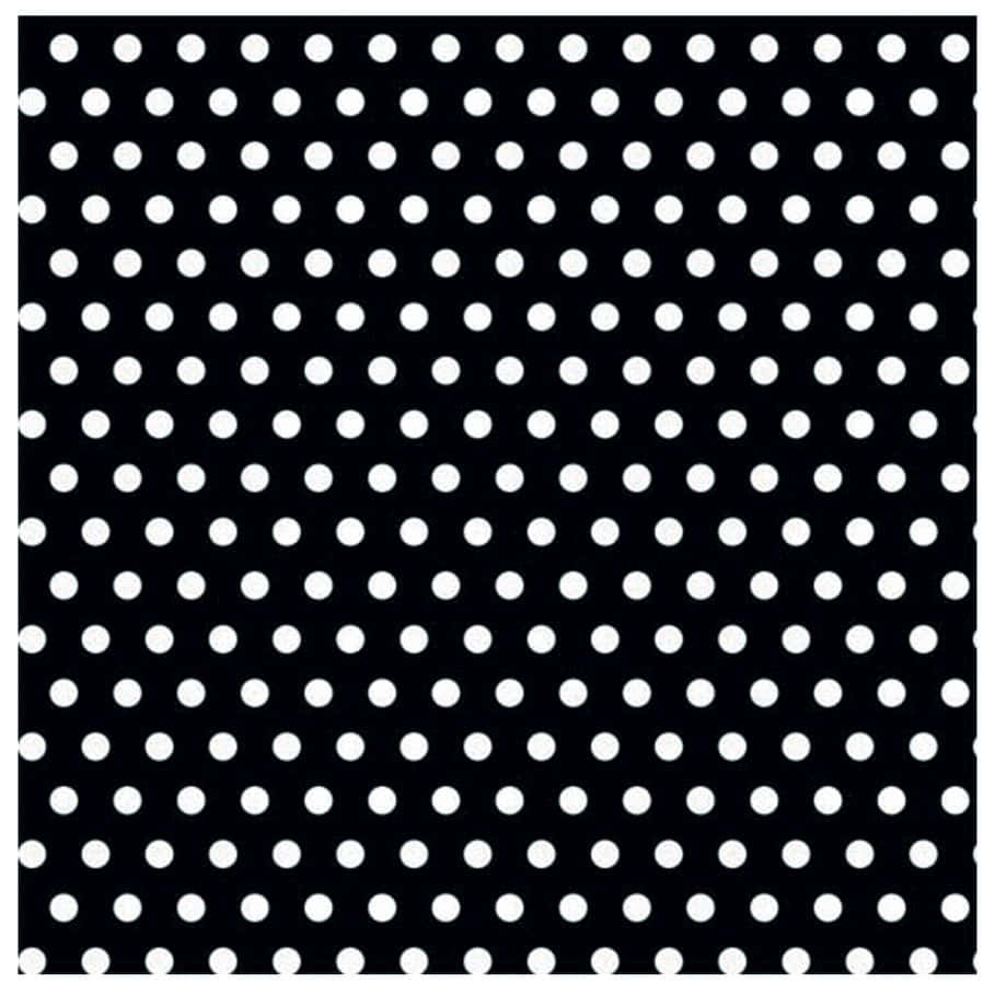 Black Polka Dot 桌布 壁紙 — 大膽的黑色背景上均勻分佈著白色圓點，形成高對比的幾何圖案。
