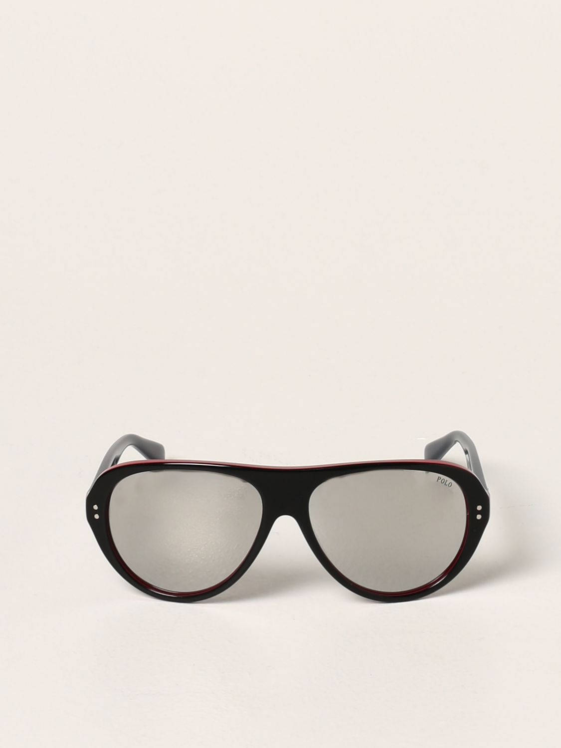 glasses 桌布 壁紙 — 大膽的黑色飛行員太陽眼鏡，帶有紅色飾邊和銀色鏡面鏡片，放在純米白色表面上。