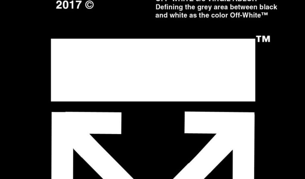 Off White Desktop 桌布 壁紙 — 大膽簡約的黑白圖案，以風格化的箭頭標誌襯托在鮮明背景上。