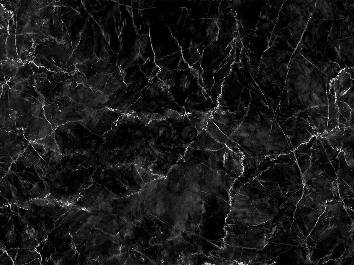 Black Marble 桌布 壁紙 — 奢華黑色大理石的近距離特寫，帶有複雜的白色紋理，營造出戲劇性的高對比自然圖案。