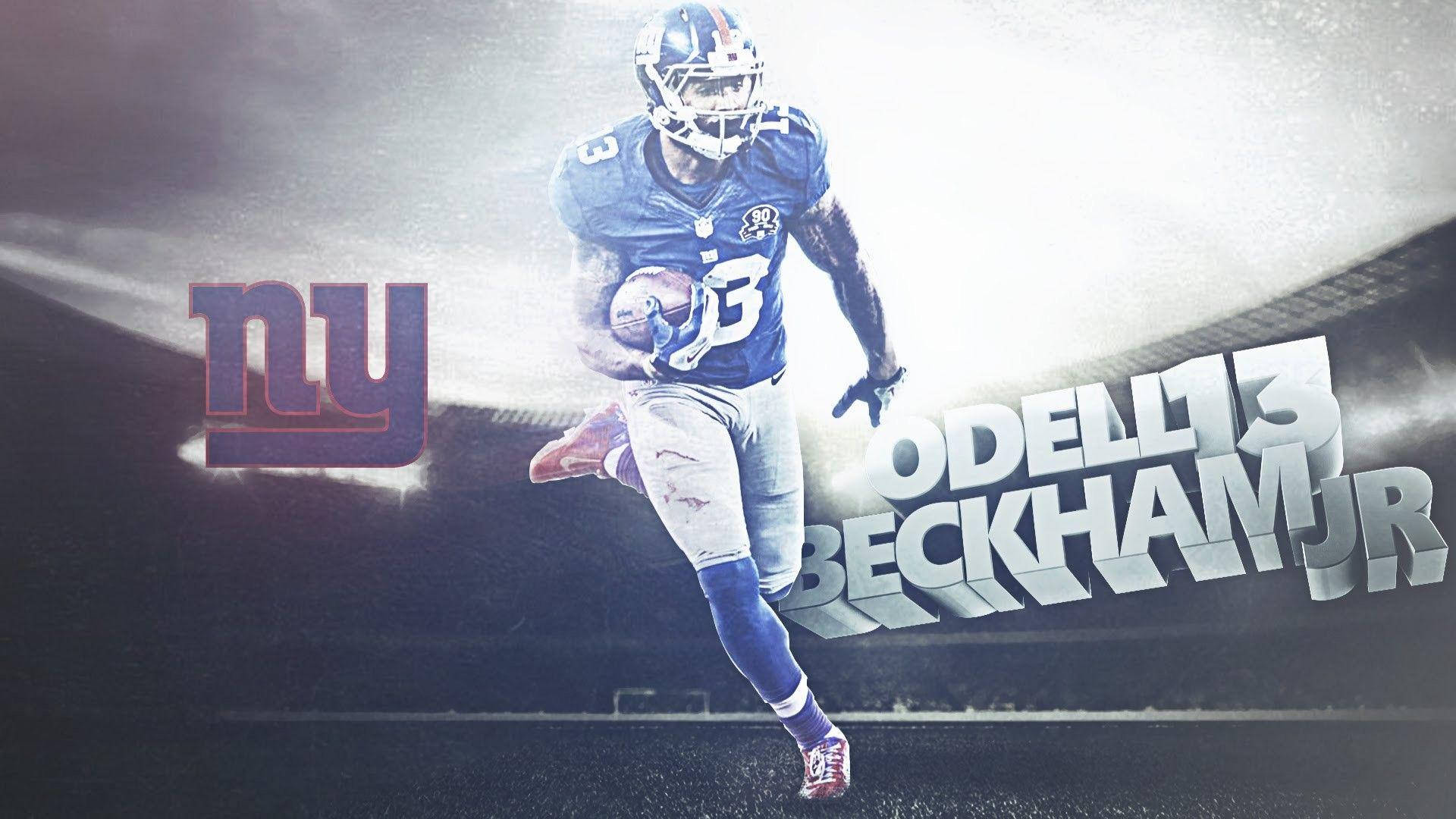 Odell 桌布 壁紙 — 奧德爾·貝克漢姆 Jr. 身穿藍色紐約巨人隊球衣，在戲劇性的體育場燈光下帶著橄欖球衝刺。