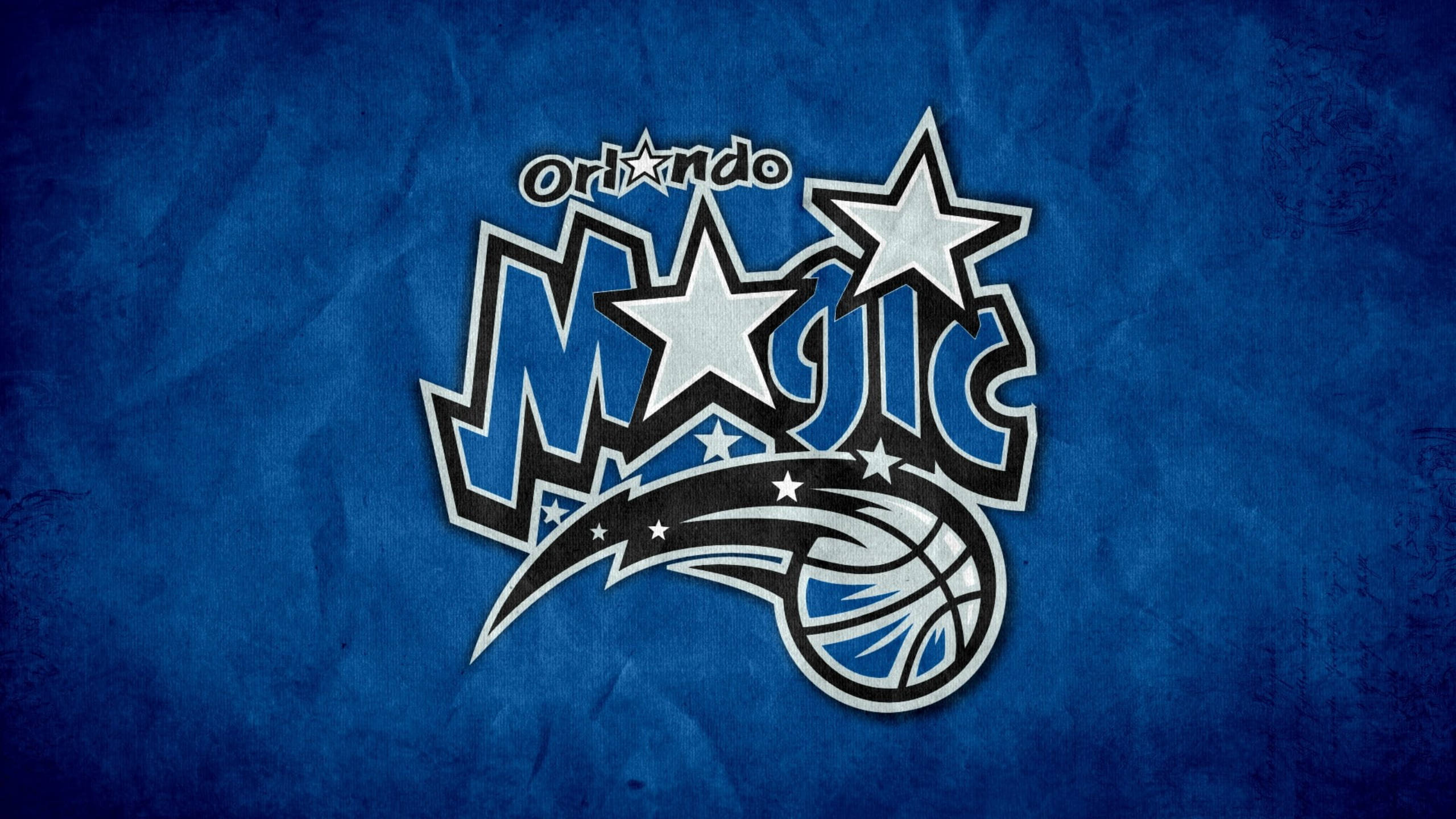 Orlando 桌布 壁紙 — 奧蘭多魔術籃球標誌，帶有星星和籃球，背景為紋理藍色。