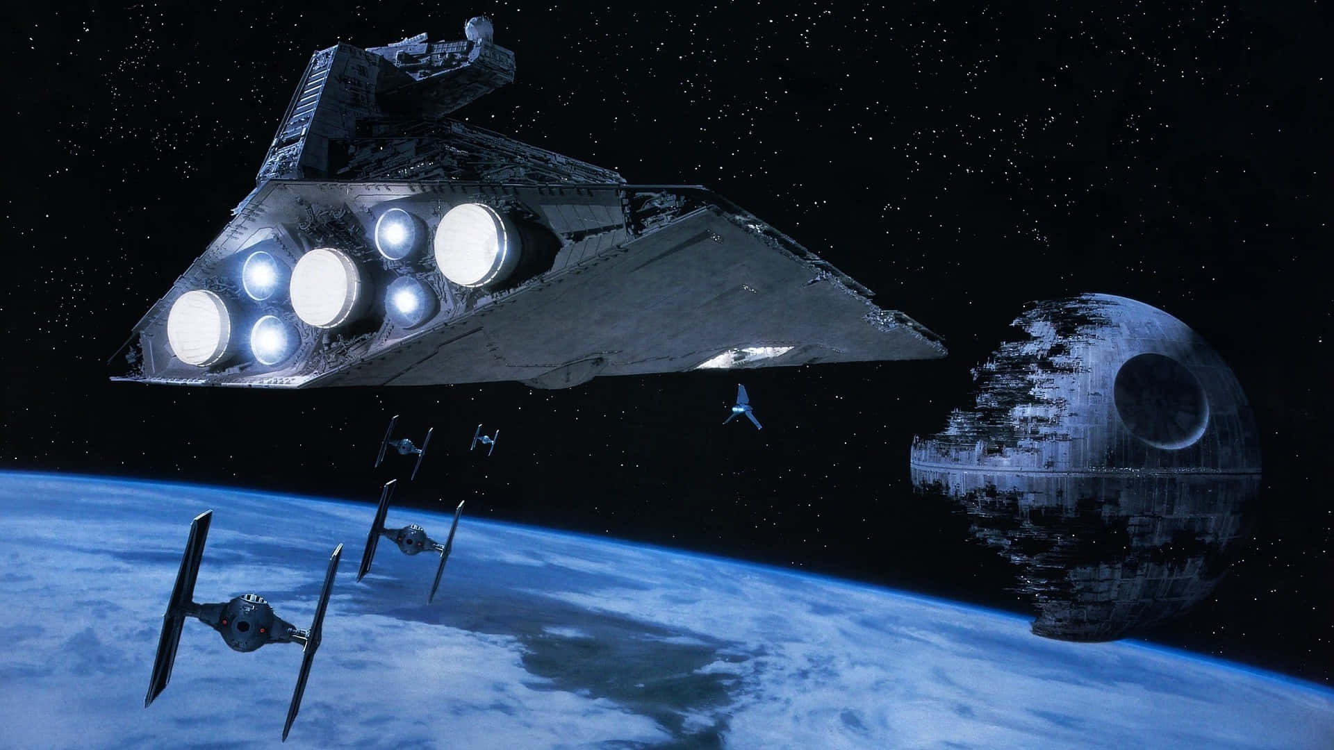 Death Star Ii 桌布 壁紙 — 威嚴的星際驅逐艦和TIE戰鬥機在藍色星球上空翱翔，死星在星空中若隱若現。