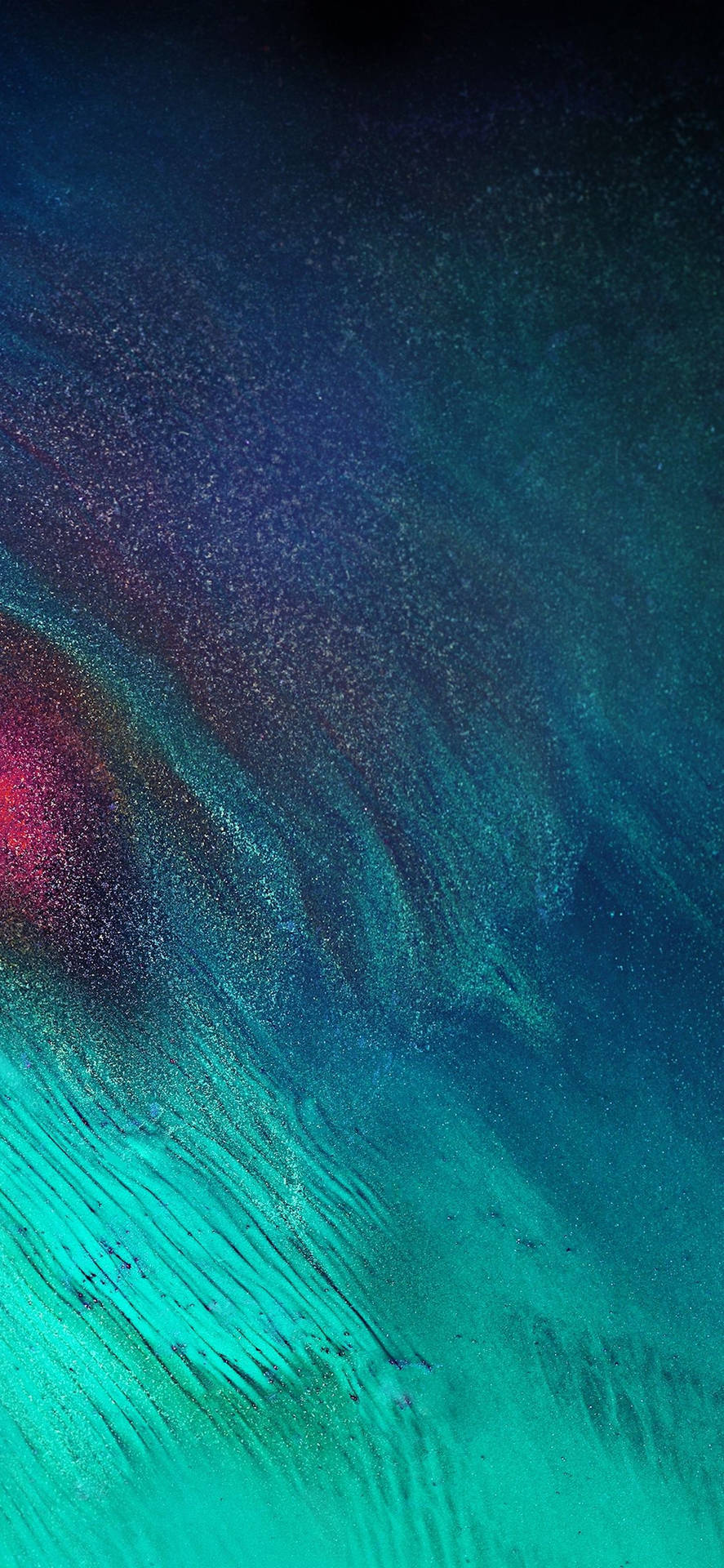  壁紙 — 宇宙星雲以電光藍綠和深靛藍色旋轉，點綴著發光的粒子。