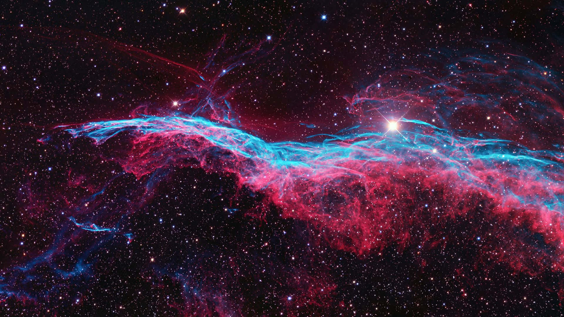 1920 X 1080 Nebula 桌布 壁紙 — 宇宙星雲在星空背景下以鮮豔的紅色和電光藍色旋轉。