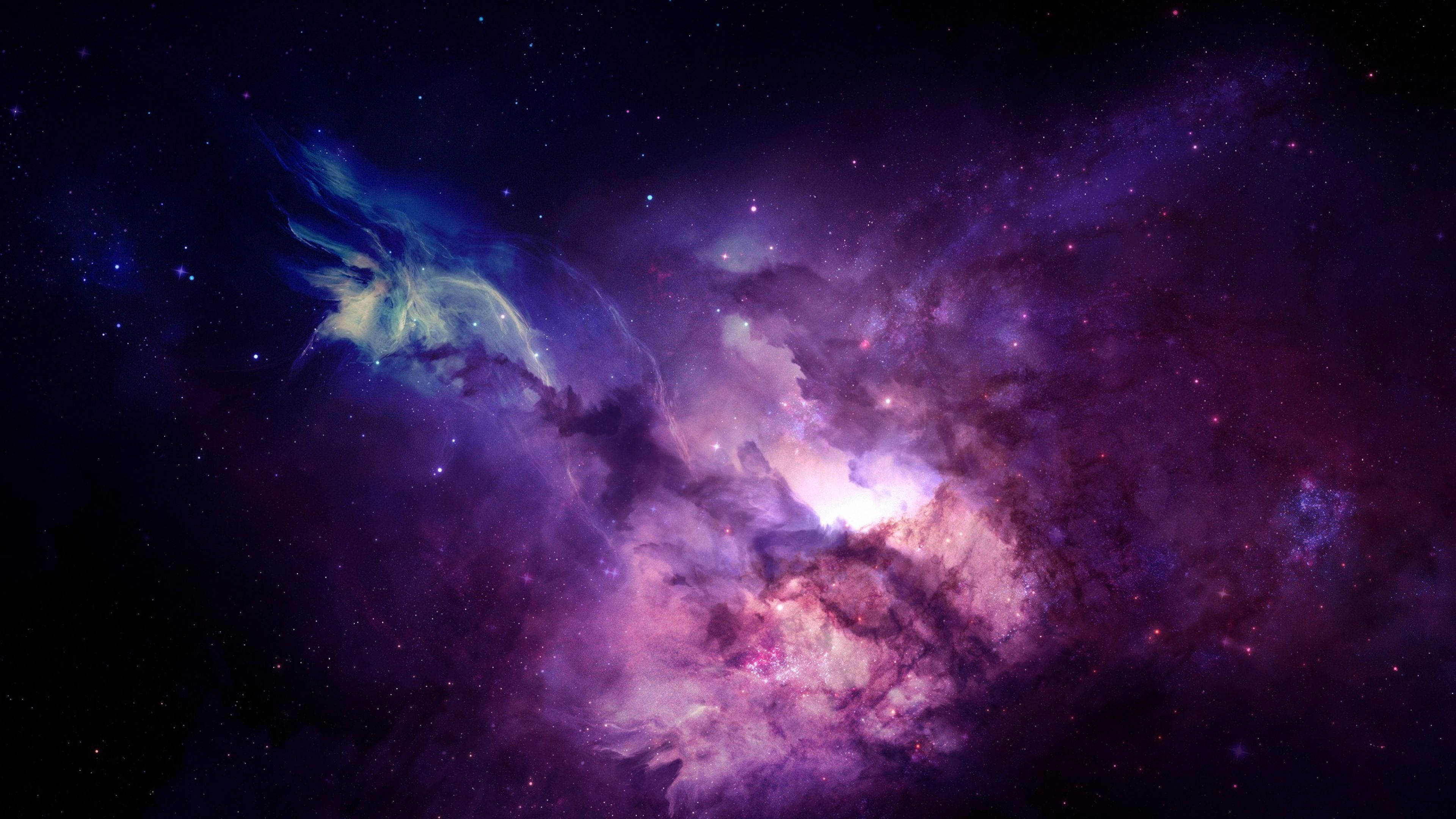 4K 太空 桌布 壁紙 — 宇宙星雲在星空背景下以鮮豔的紫色、粉紅色和藍色旋轉。
