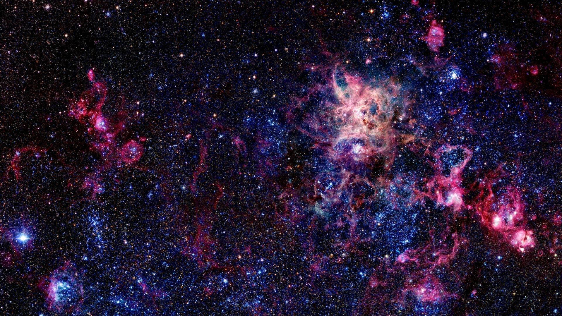 星雲 桌布 壁紙 — 宇宙星雲在星空背景下旋轉著充滿活力的粉紅色和藍色氣體。