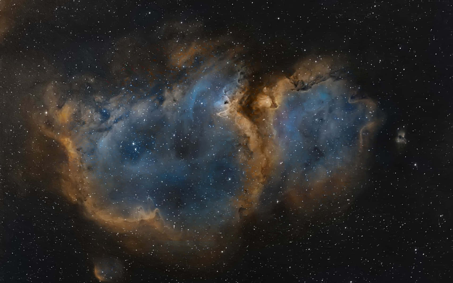 在無數星辰中閃耀的鮮豔藍色和橙色星雲。 — 星雲 GIF 壁紙