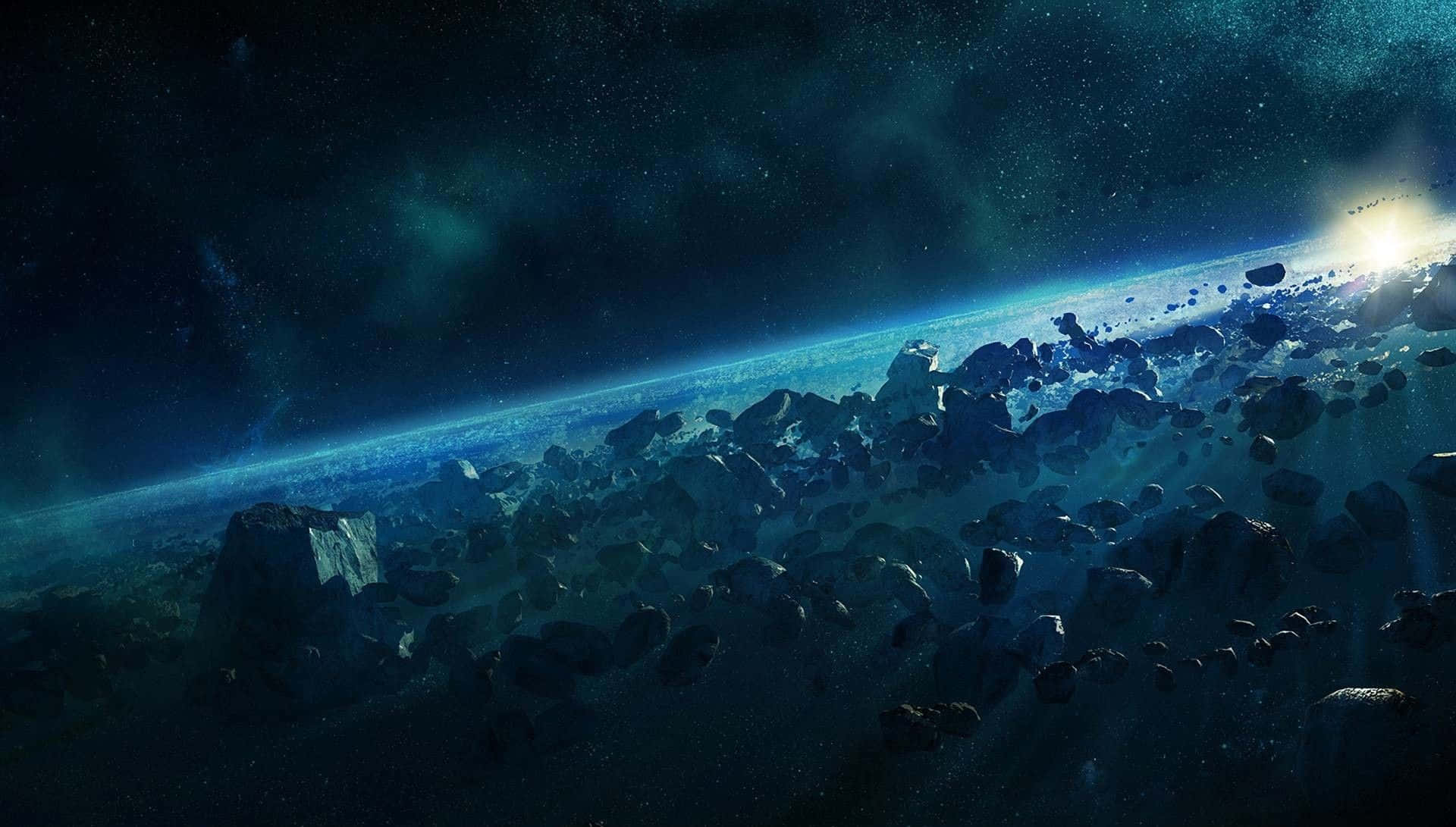 Halo Ring 桌布 壁紙 — 宇宙景觀，鋸齒狀小行星漂浮在深空中，伴隨著發光的行星地平線和星場。