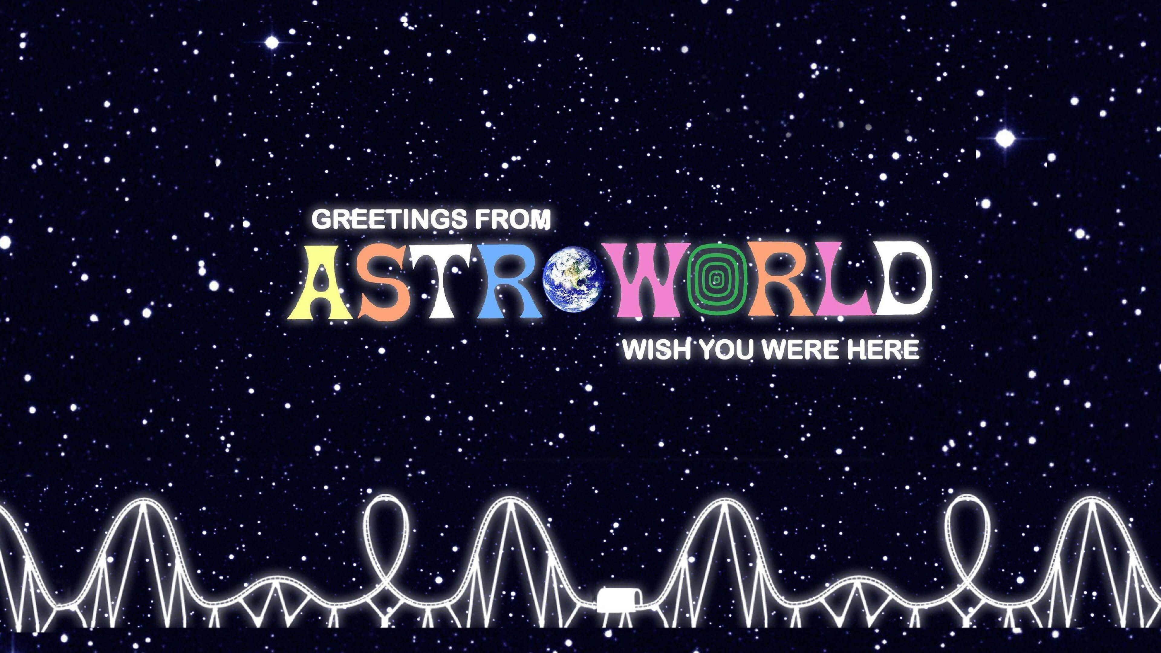 Astroworld 桌布 壁紙 — 宇宙雲霄飛車在繁星點點的夜空下，在色彩繽紛的AstroWorld標誌下方發出白光。